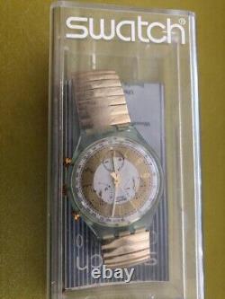 Reloj cronógrafo Swatch Golden Globe SCG100-1993 new original box